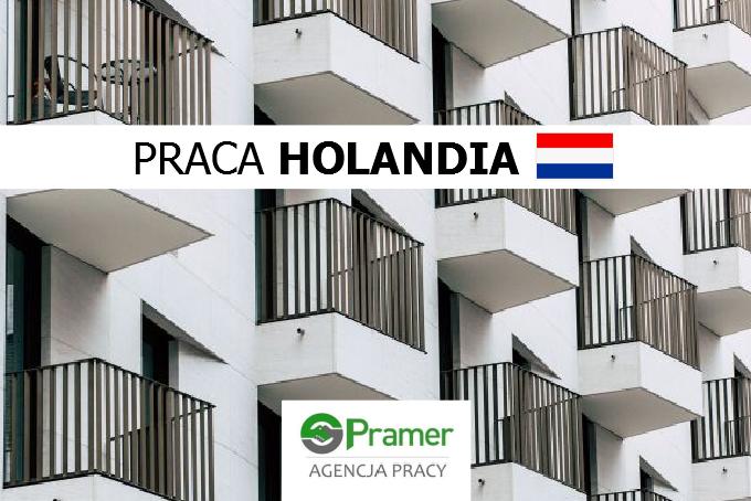 Pracownik techniczny przy skręcaniu balustrad balkonowych